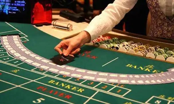 Filipino player checking ph958 withdrawal status on mobile phone
